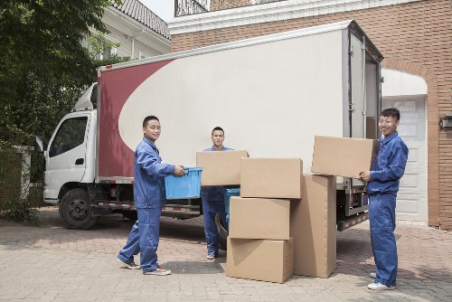 Movers working in a Highgate residential street with period homes