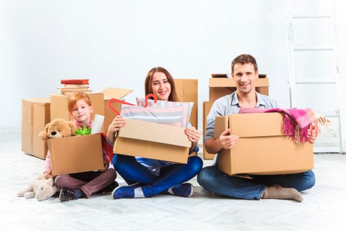 Moving team planning a house removal in Highgate on a residential street