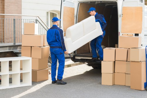 Management reviewing health and safety procedures for removals