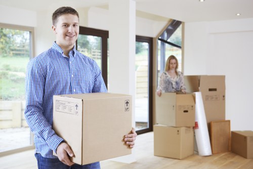 Professional movers handling a flat move with stairs in Highgate