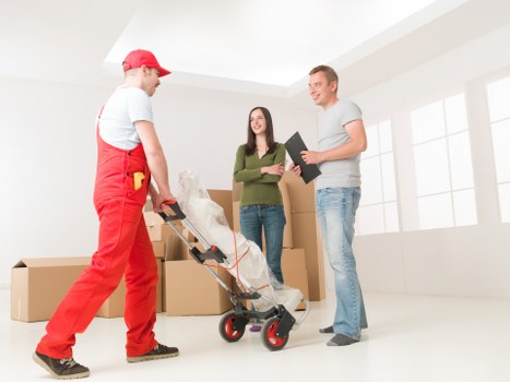 Loading furniture into a van for a Highgate relocation