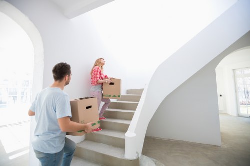 Packed boxes and furniture ready for a moving van in Highgate