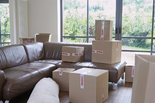 Careful unloading and placement of boxes at a Highgate property